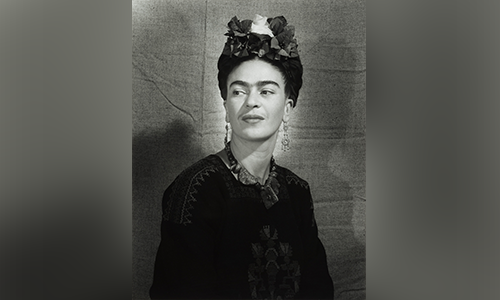 A black and white photo of Frida Kahlo