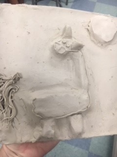 clay tile of a llama