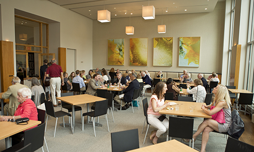 Visitors sit at tables in the Terrace Café 