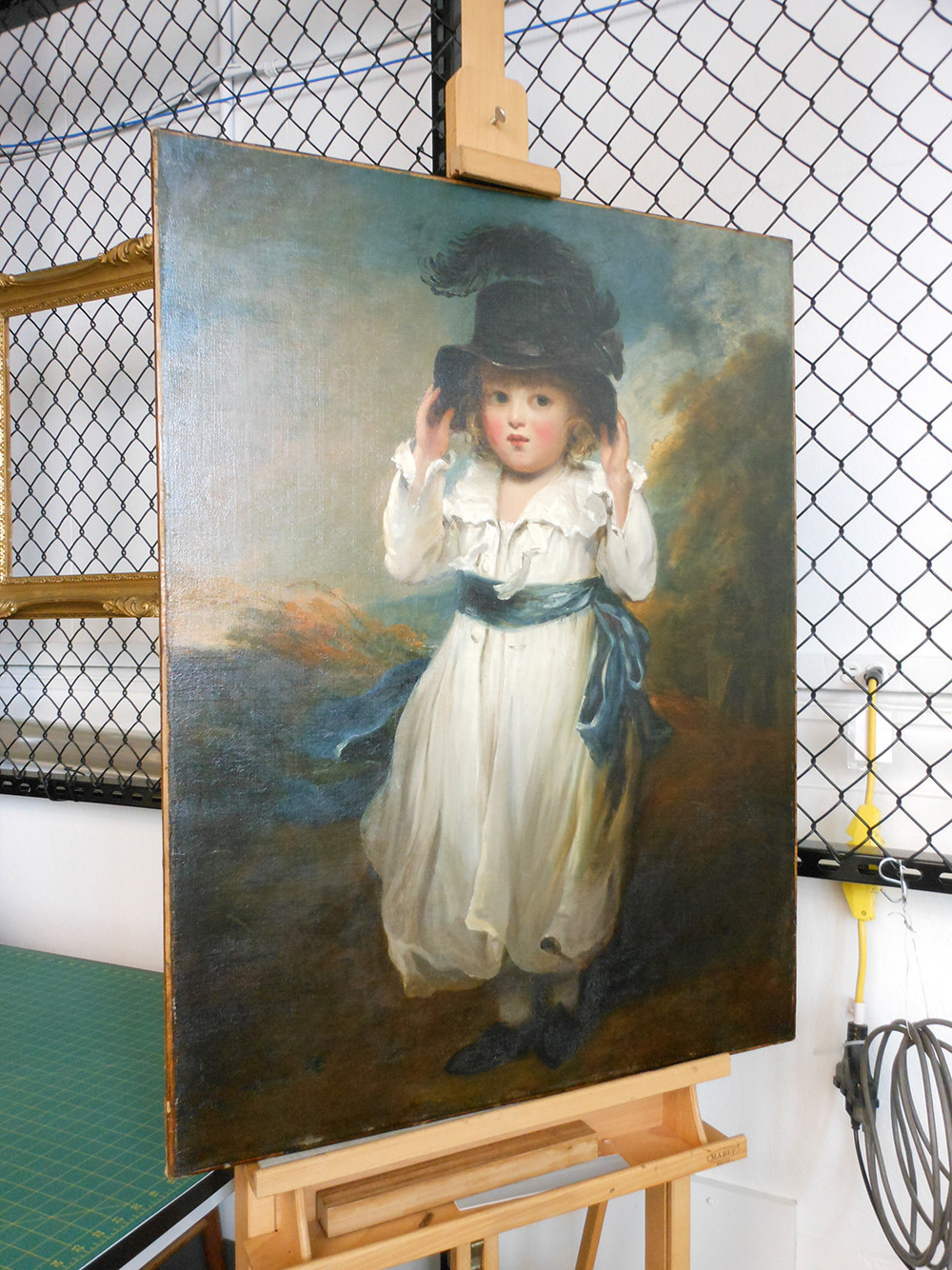 The painting, fully conserved. The painting is no longer grimy.