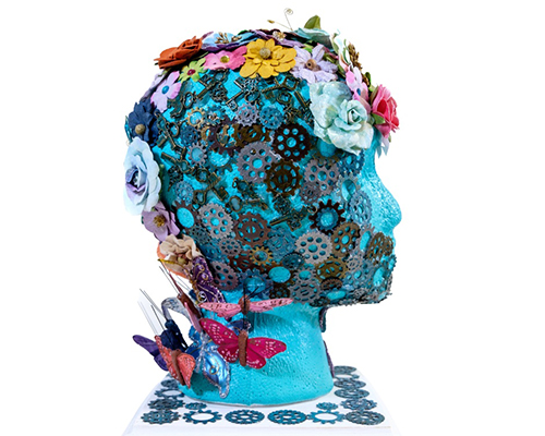 A blue head covered with small gears and colorful flowers.