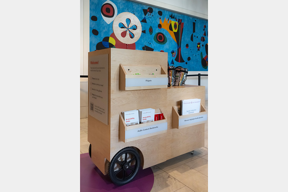 A wooden cart with accessibility resources