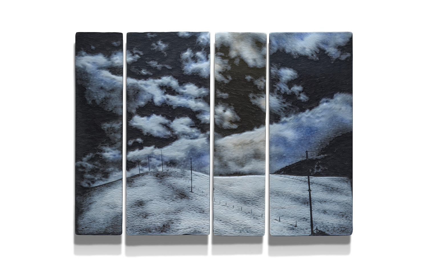 An image of a hillside in the dark separated into four segments