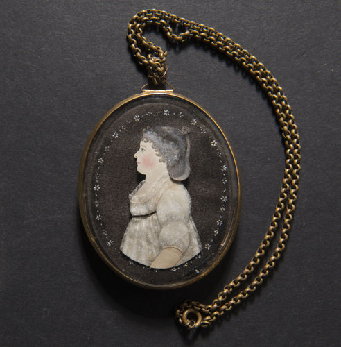 oval portrait of a woman on a neckalce