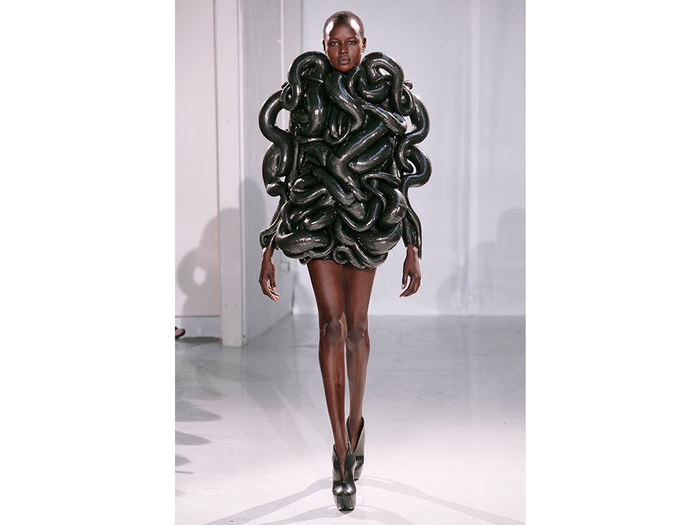 Iris van Herpen's Capriole, a short black dress made up of twisting, shiny tentacles