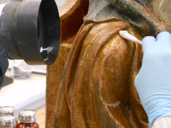 sculpture of St. Peter undergoing cleaning