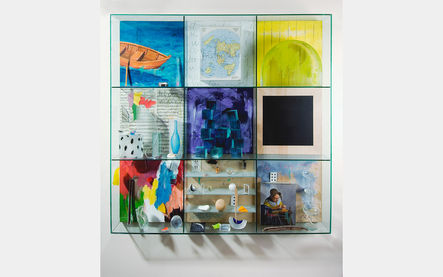 A glass wall piece with six colorful square segments