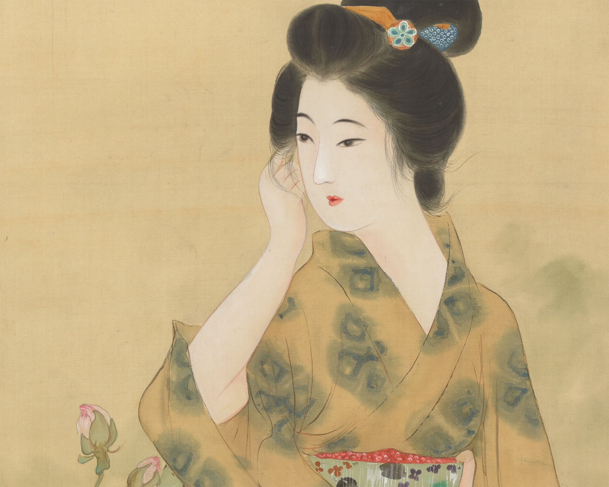 A beautiful woman in a fine kimono touches her face