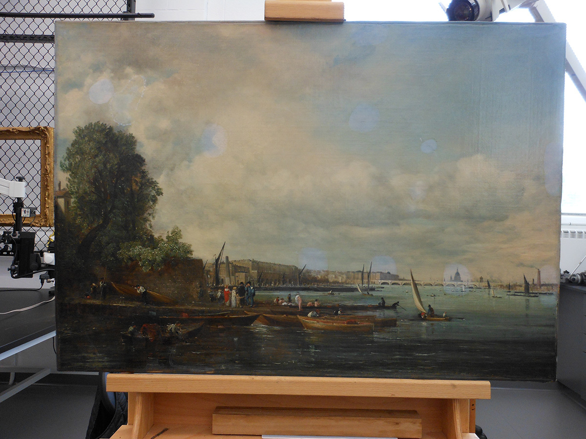 A large landscape painting with yellowed clouds and spots where the yellowing has been removed