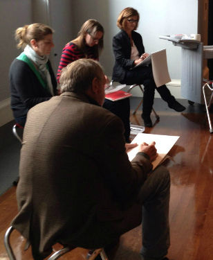 Artists sketching in the museum