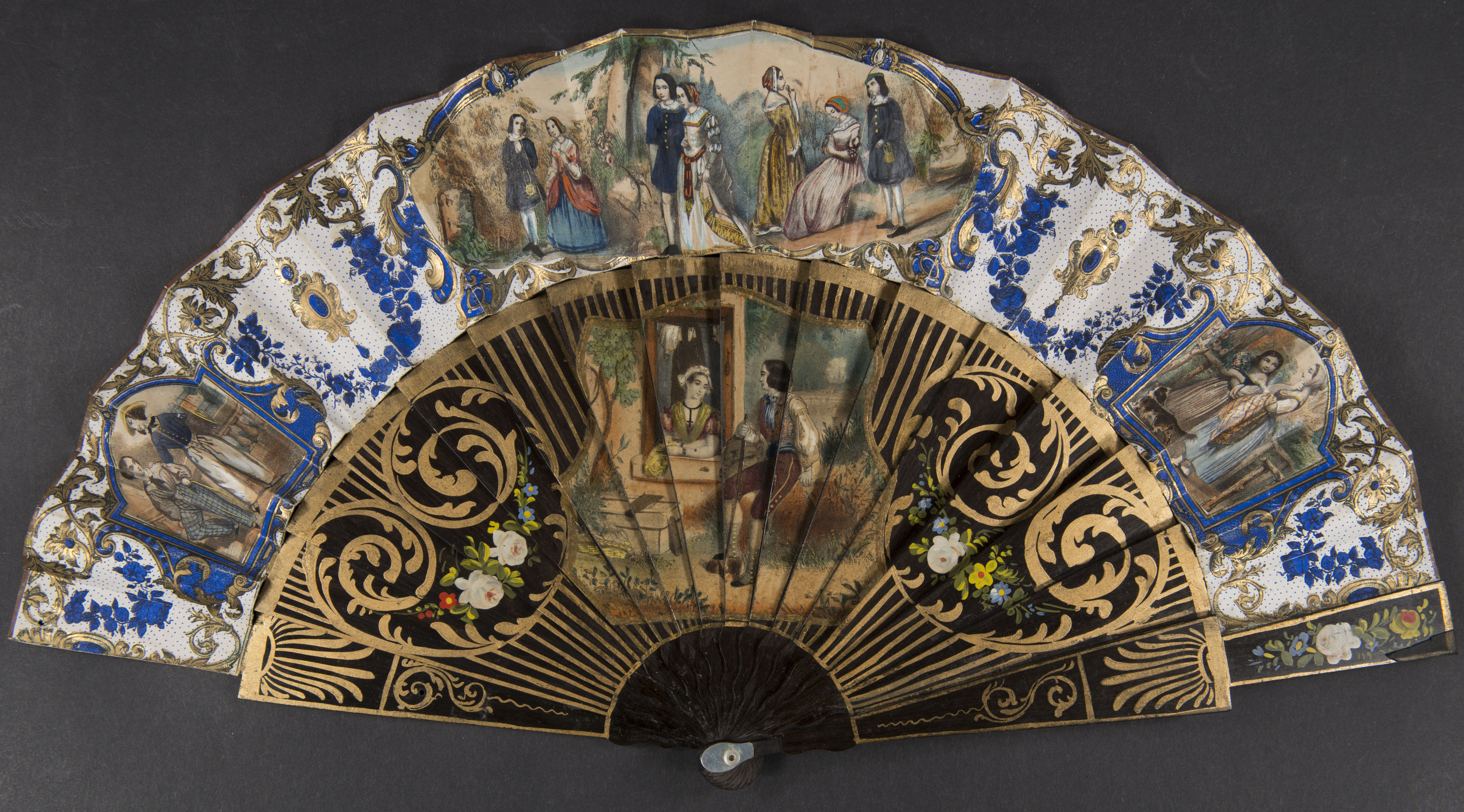 hand fan ornately decorated in blue and gold with illustrations of the upper class