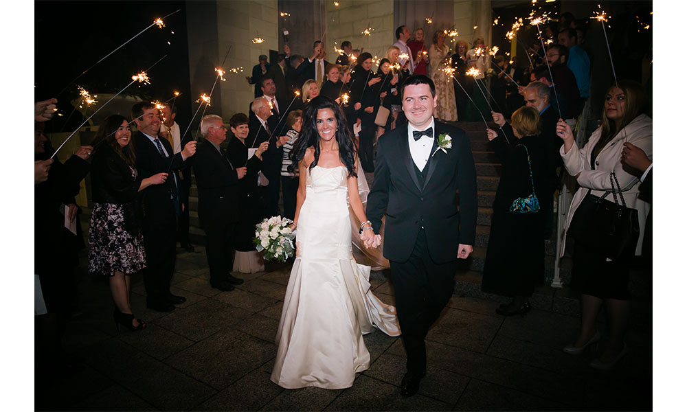 bride and groom leaving the reception