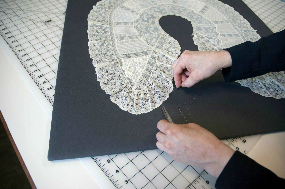 embroidered lace collar in conservation