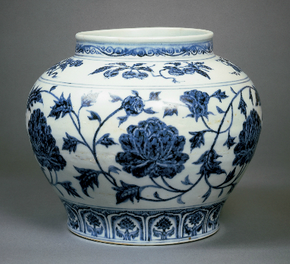 white and blue porcelain jar