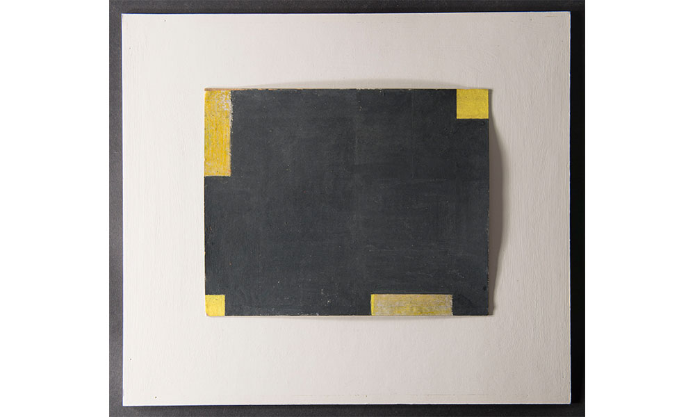 abstract painting of a black rectangle with yellow corners in various sizes