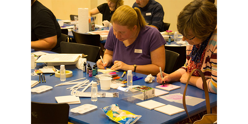 Teachers working on arts and crafts