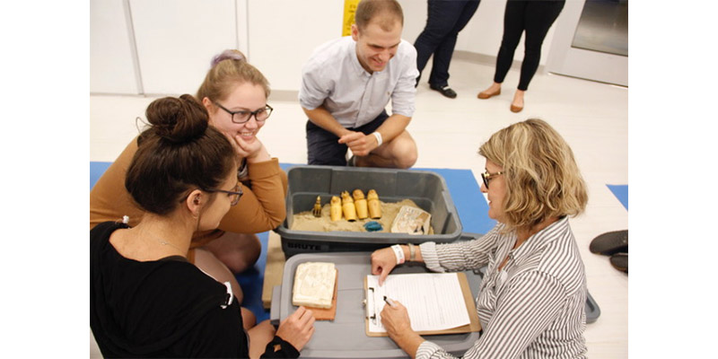 A group of four teachers working together