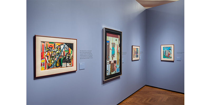 Various artworks within the Romare Bearden exhibition