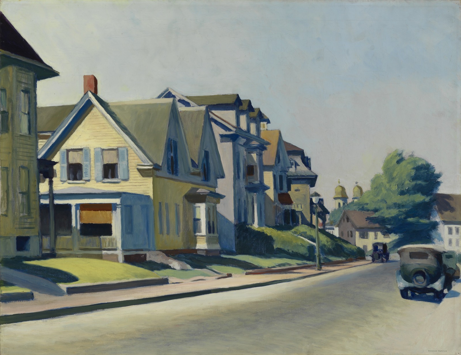 Edward Hopper's Son on Prospect Street, a painting of a suburban street with a row of houses on the left curving off into the distance. An old car is parked across the street against the curb 