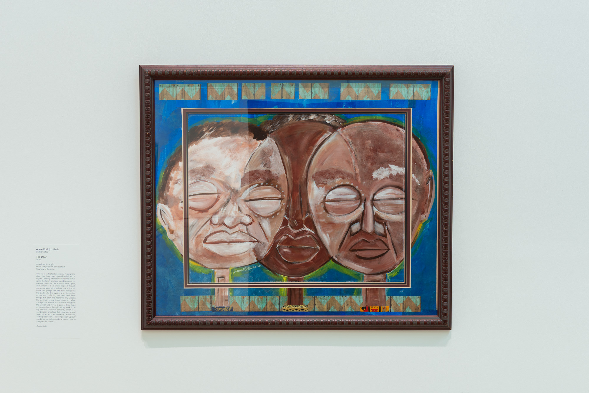 Annie Ruth's The Door, an abstract painting of three African American faces in front of a blue backdrop, each wearing a collar with a decorative print. a large rectangle frames the three faces