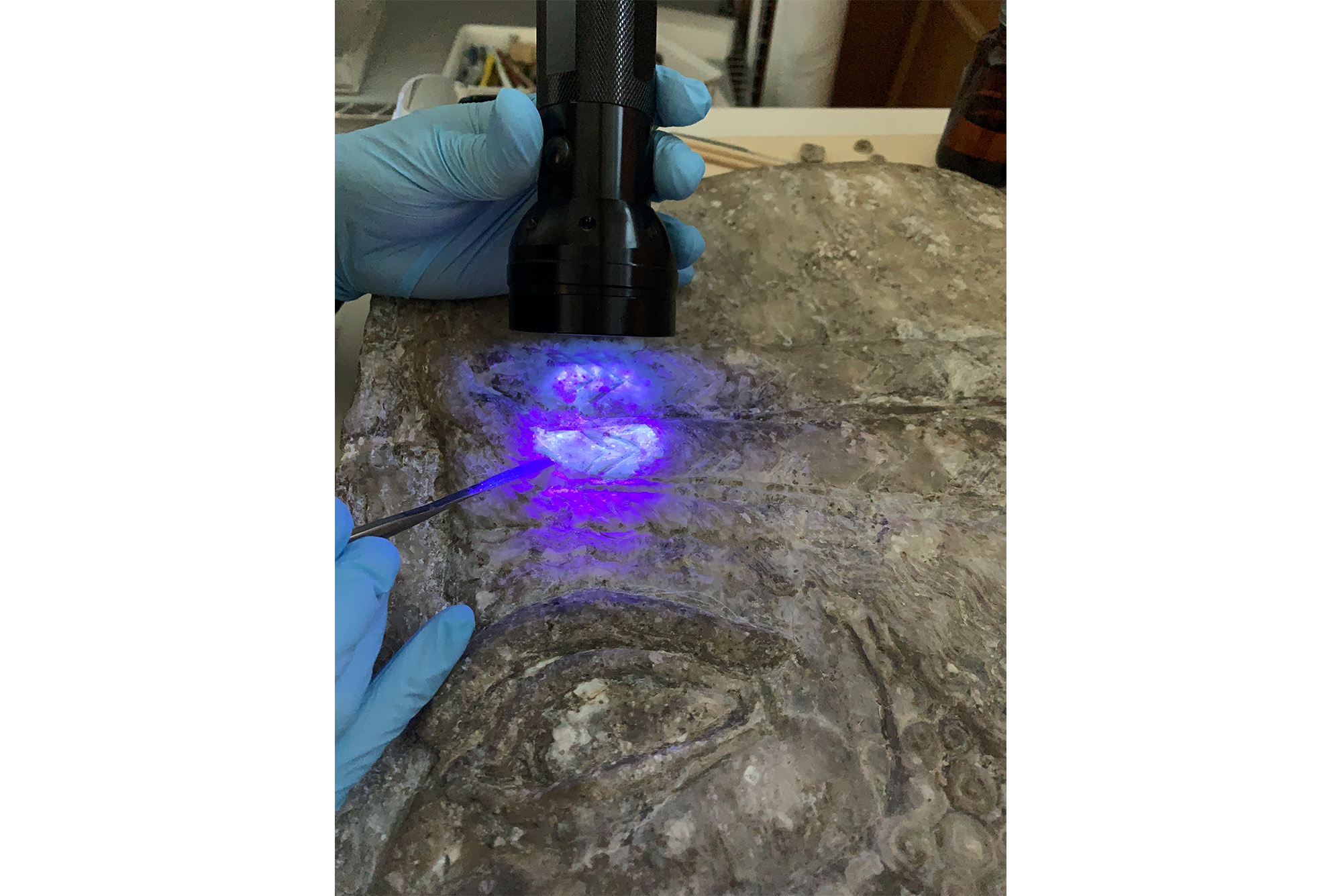 UV light shining on stone tablet