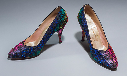 rainbow patterned heels with a black floral pattern studded in small glass jewels