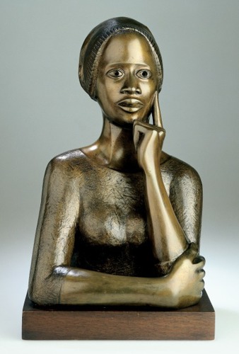 bronze bust of an African woman