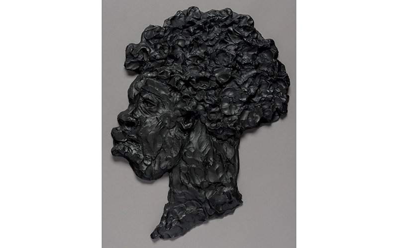 Kara Walker's False Face, a coarsely textured bust of a Black figure.