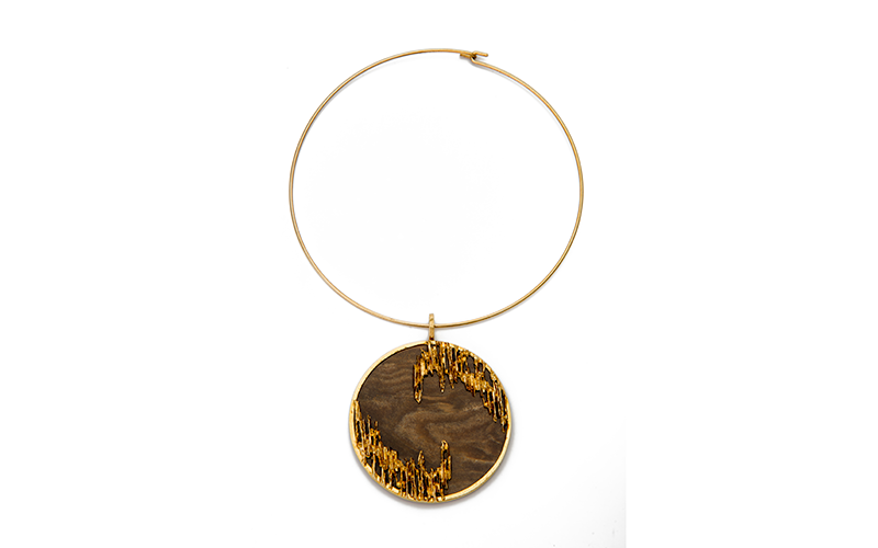 Kutchinsky (British, est. 1893), Pendant, 1972, gold, petrified wood