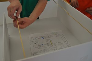 student building a model