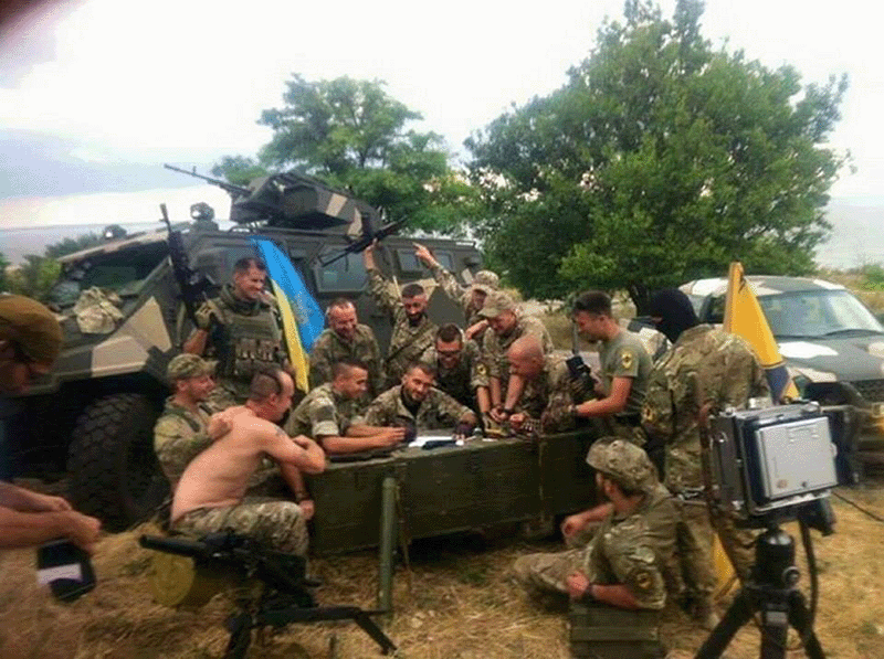 Ukrainian soldiers recreating the painting early in the Donbas war following the 2014 Maidan Revolution in Ukraine and Russia’s annexation of Crimea, August 2015
