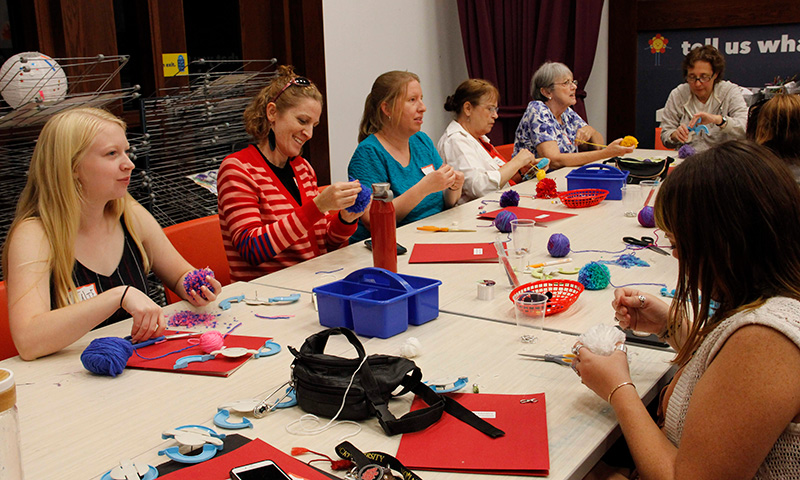 A group of adults make art at the Cincinnati Art Museum