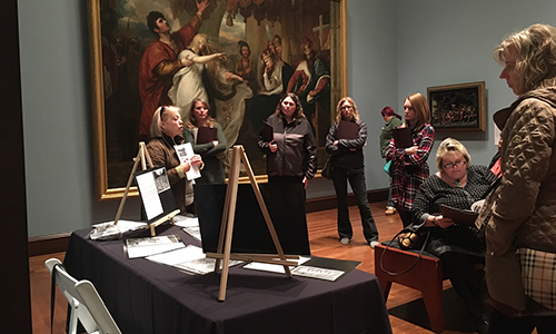 A docent gives a presentation