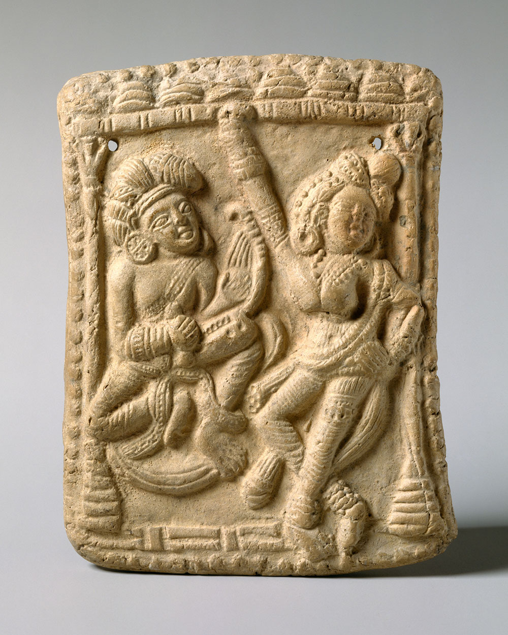 Plaque Depicting Dancer and Instrumentalist
circa 100–1 BCE
India; Uttar Pradesh
terracotta
Metropolitan Museum of Art, Samuel Eilenberg Collection, gift of Samuel Eilenberg, 1986.142.376
H. 5 in. (12.7 cm); W. 3 3/4 in. (9.5 cm); D. 7/8 in. (2.2 cm)
