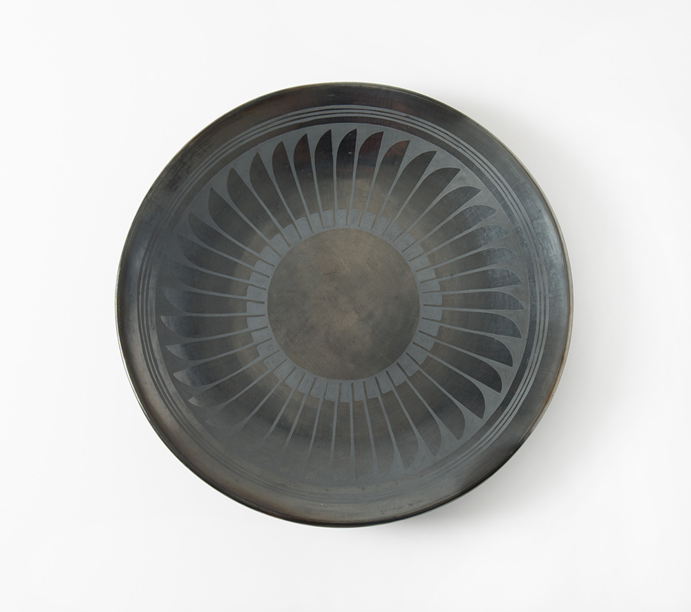 Black-on-Black Plate, Maria Martinez (American, 1887–1980) and Santana Martinez (American, 1909–2002),  circa 1945, San Ildefonso Pueblo/New Mexico/United States, ceramic, diameter 14 5/8 in. (37.1 cm), Gift of Mrs. Howard E. Wurlitzer, 1948.174