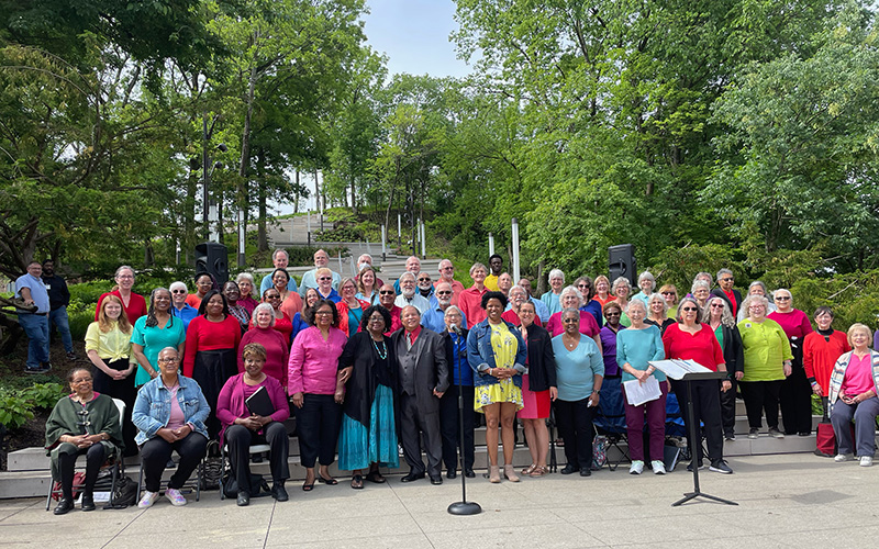 A large choir stands at the bottom of Art Climb