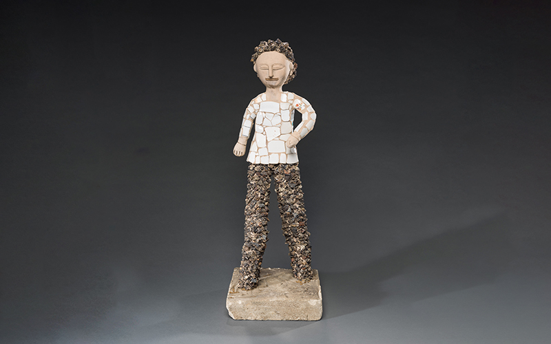 Nek Chand (Indian, 1924–2015), Standing Man, circa 1951–80, painted fired clay, broken china, rocks, and concrete, 34 1/2 x 12 x 12 in. (87.6 x 30.5 x 30.5 cm), Collection of Richard Rosenthal © The Nek Chand Foundation  