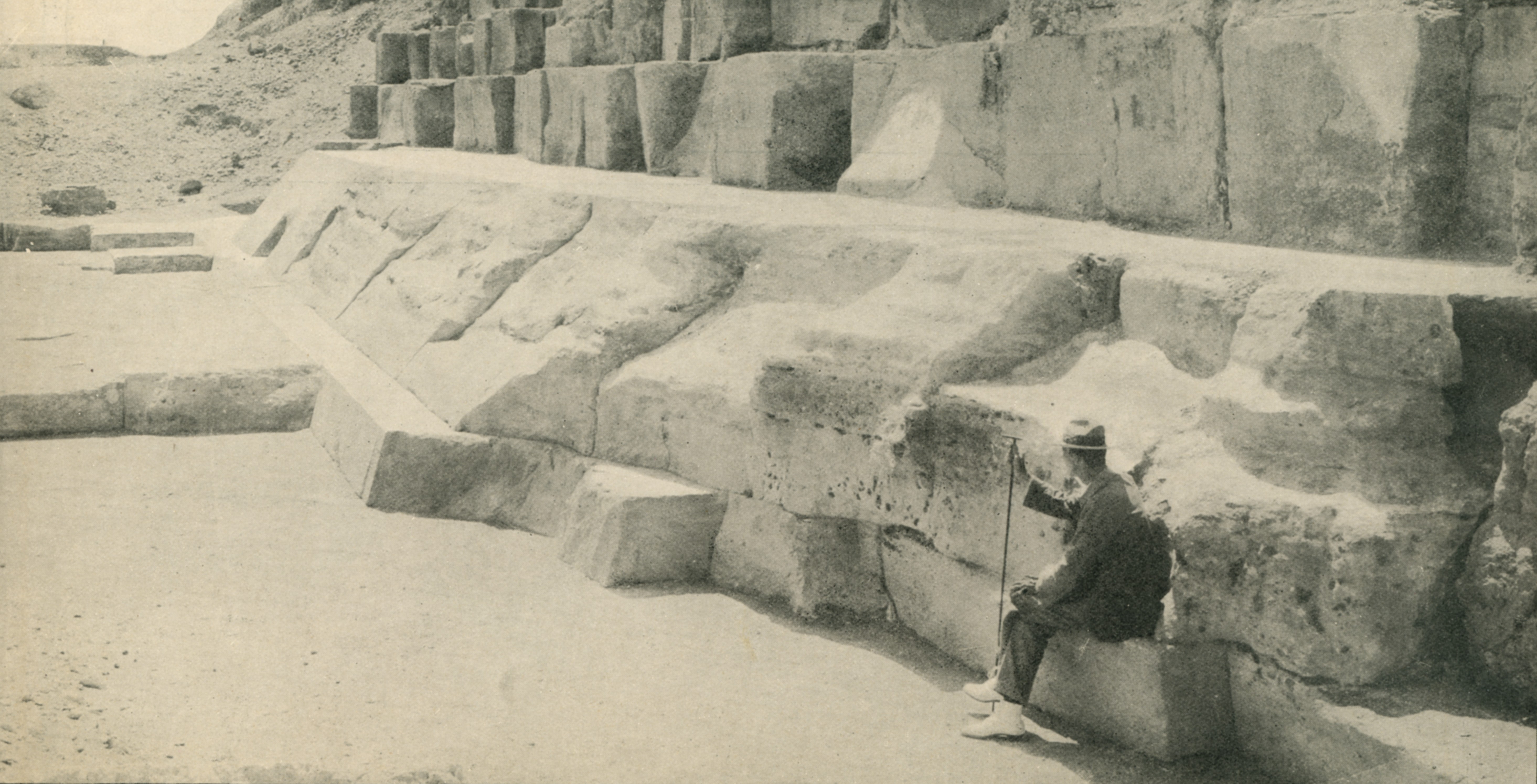 Covington sitting at the base of a pyramid