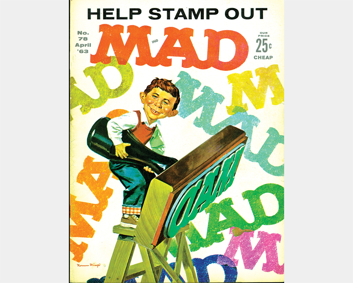 MAD Magazine cover featuring a kid with a giant MAD stamp