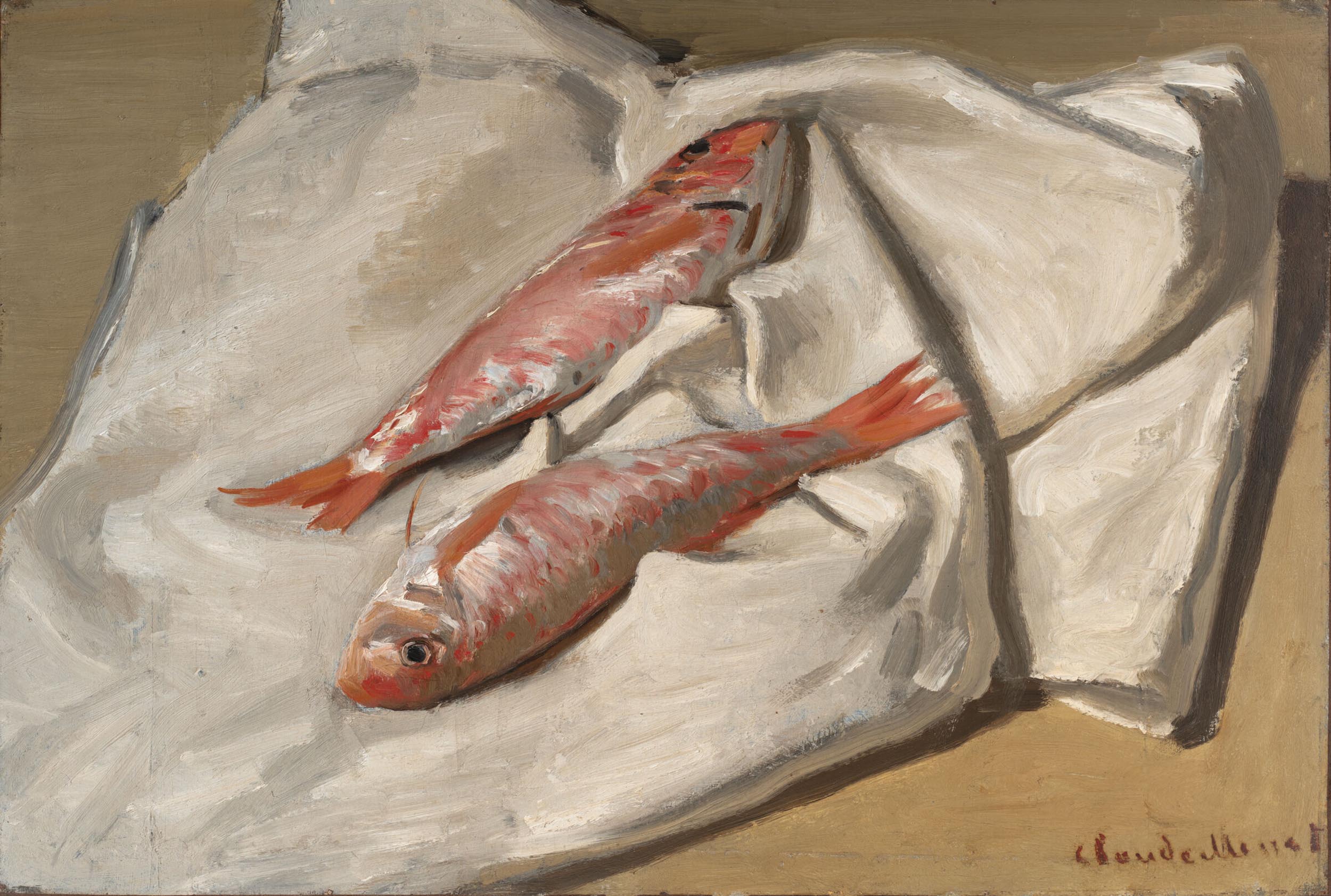 Two pink fish on a white napkin