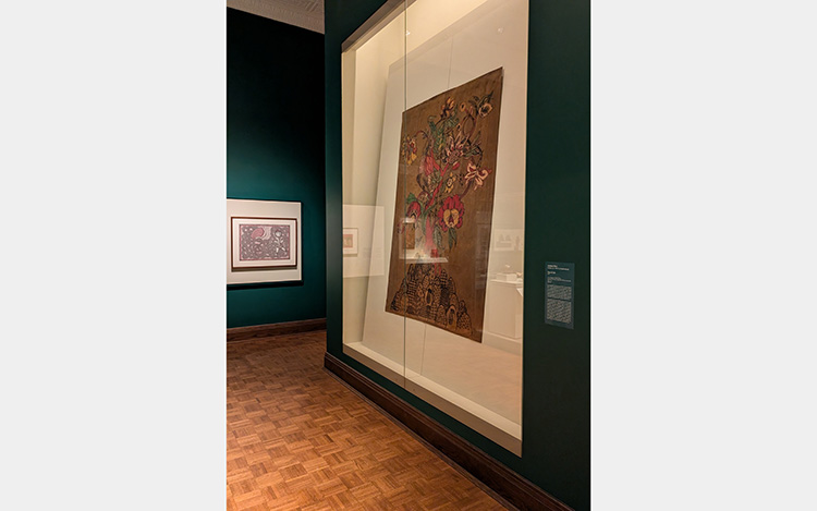 Colorful textile in display case