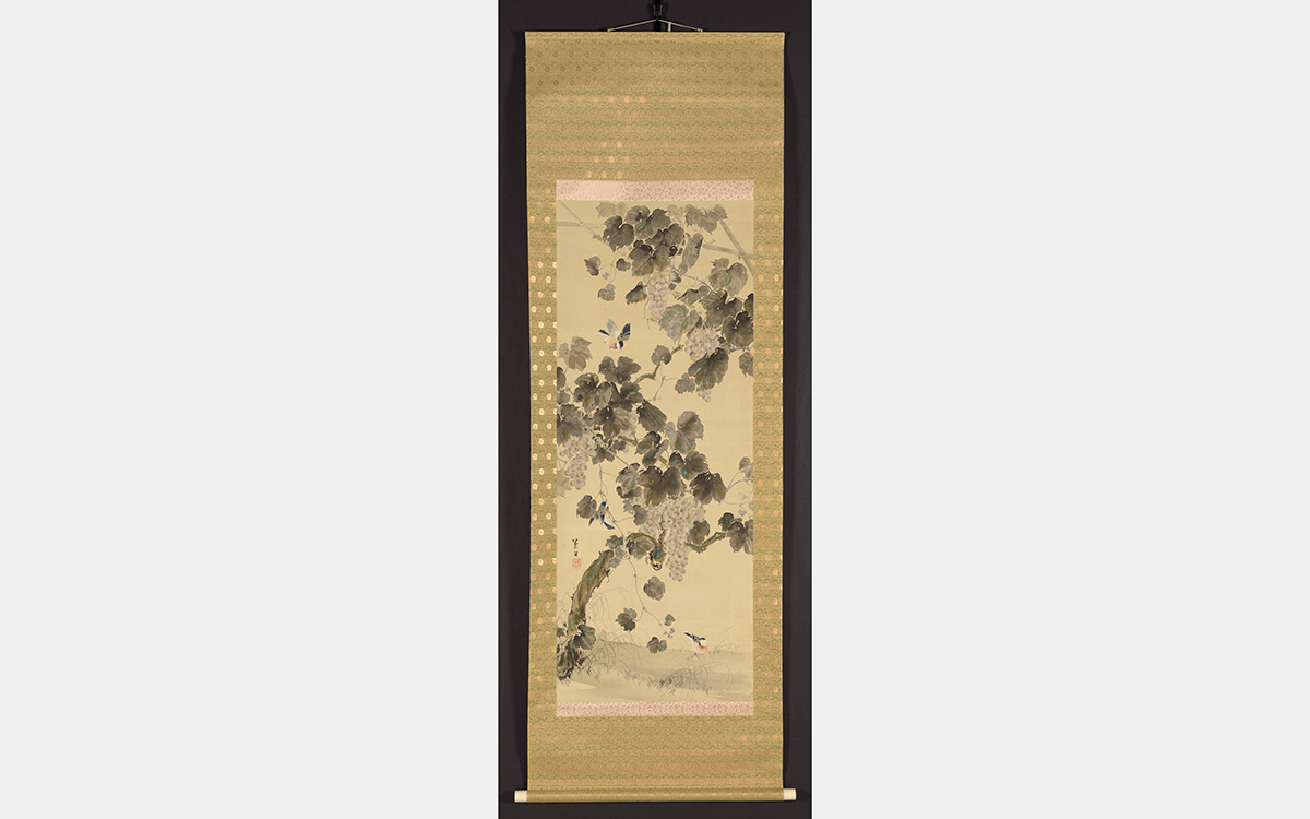 Scroll painting depicting branches, leaves, and grapes in a traditional Japanese style