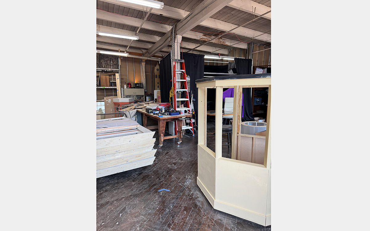 Workshop with ladder inside a large room
