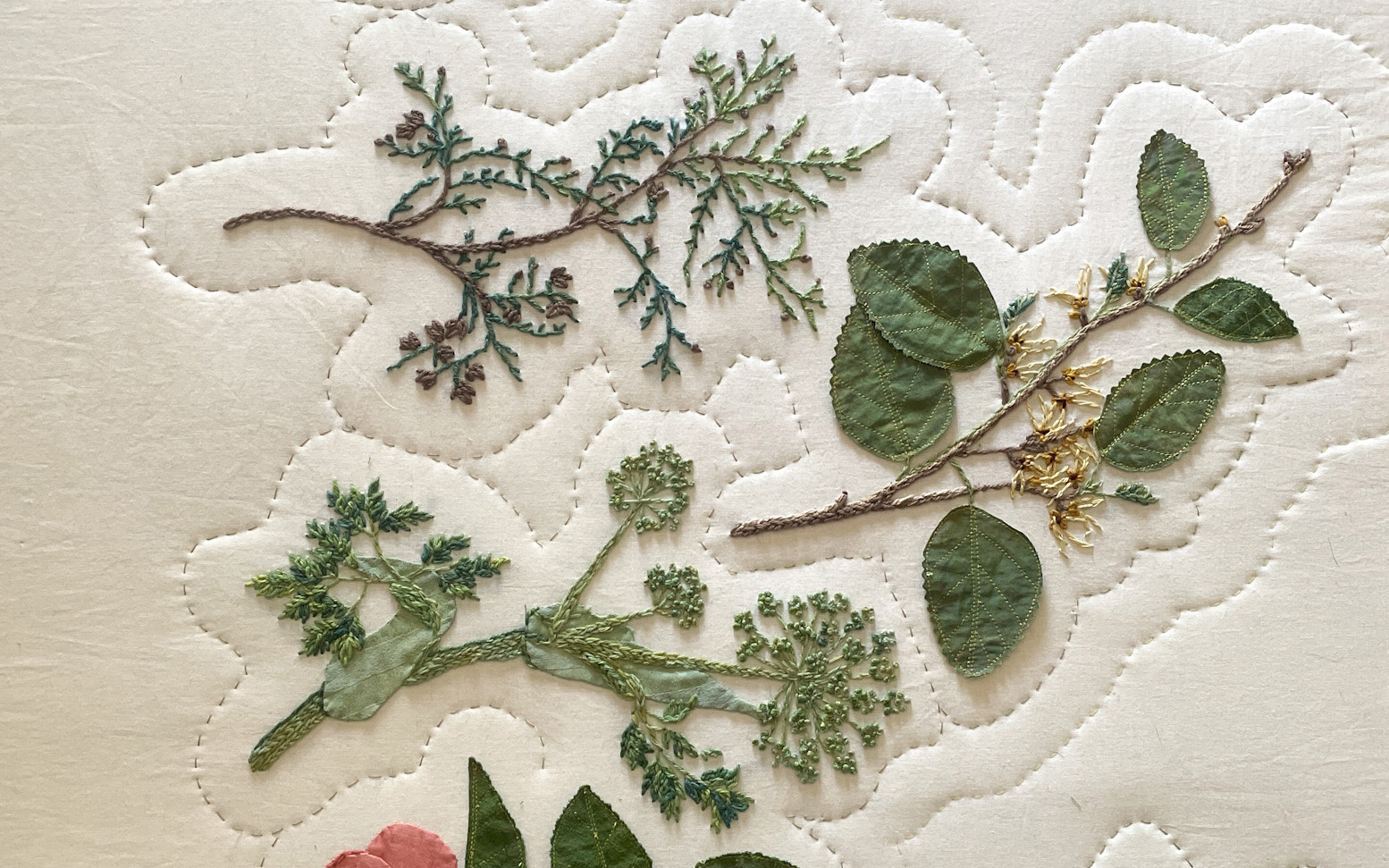 Quilted plants with light, stitched outlines