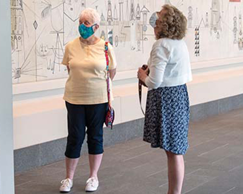 Visitors experience art on an Audio Description Tour