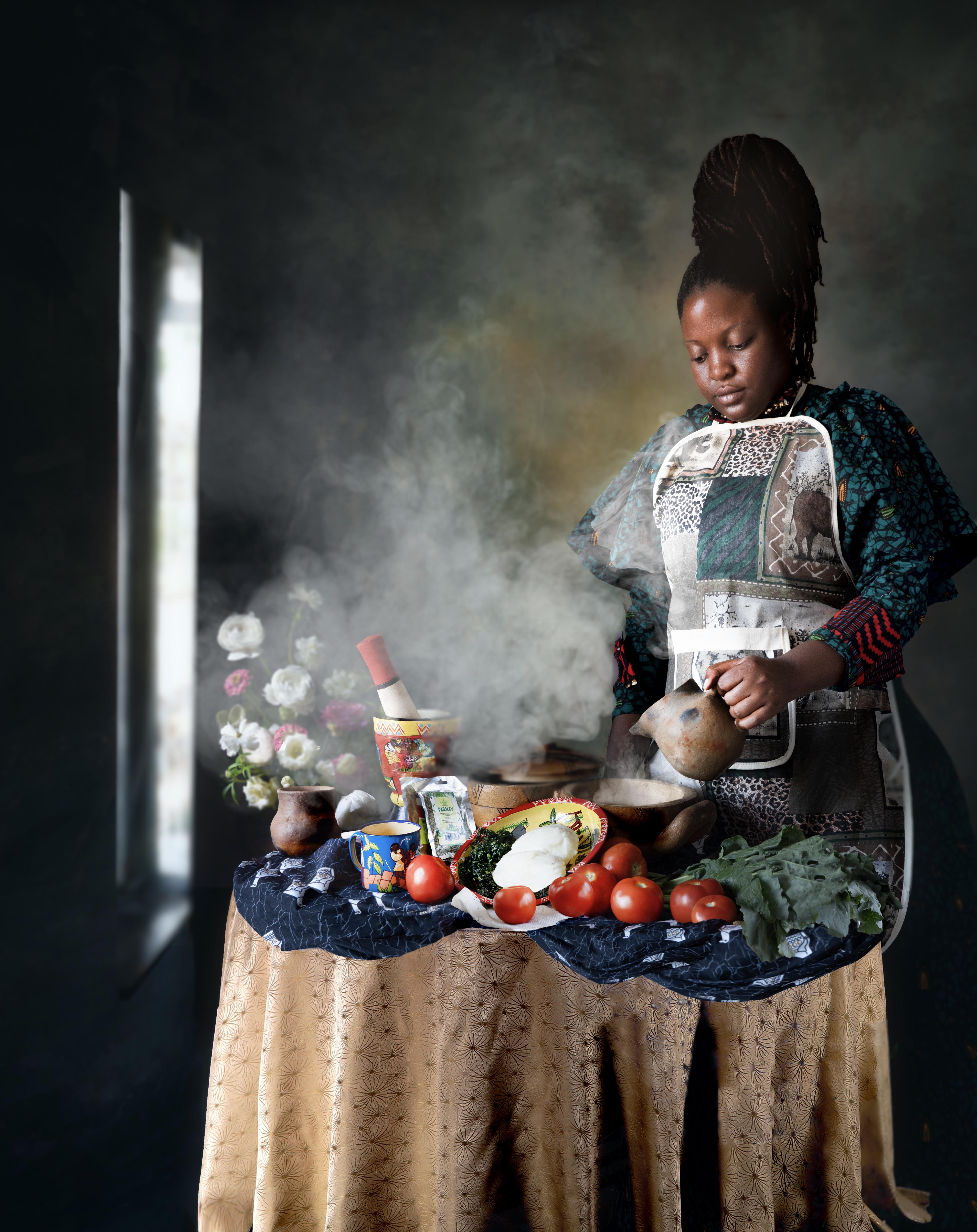 A Black woman prepares a spread of food with steaming water