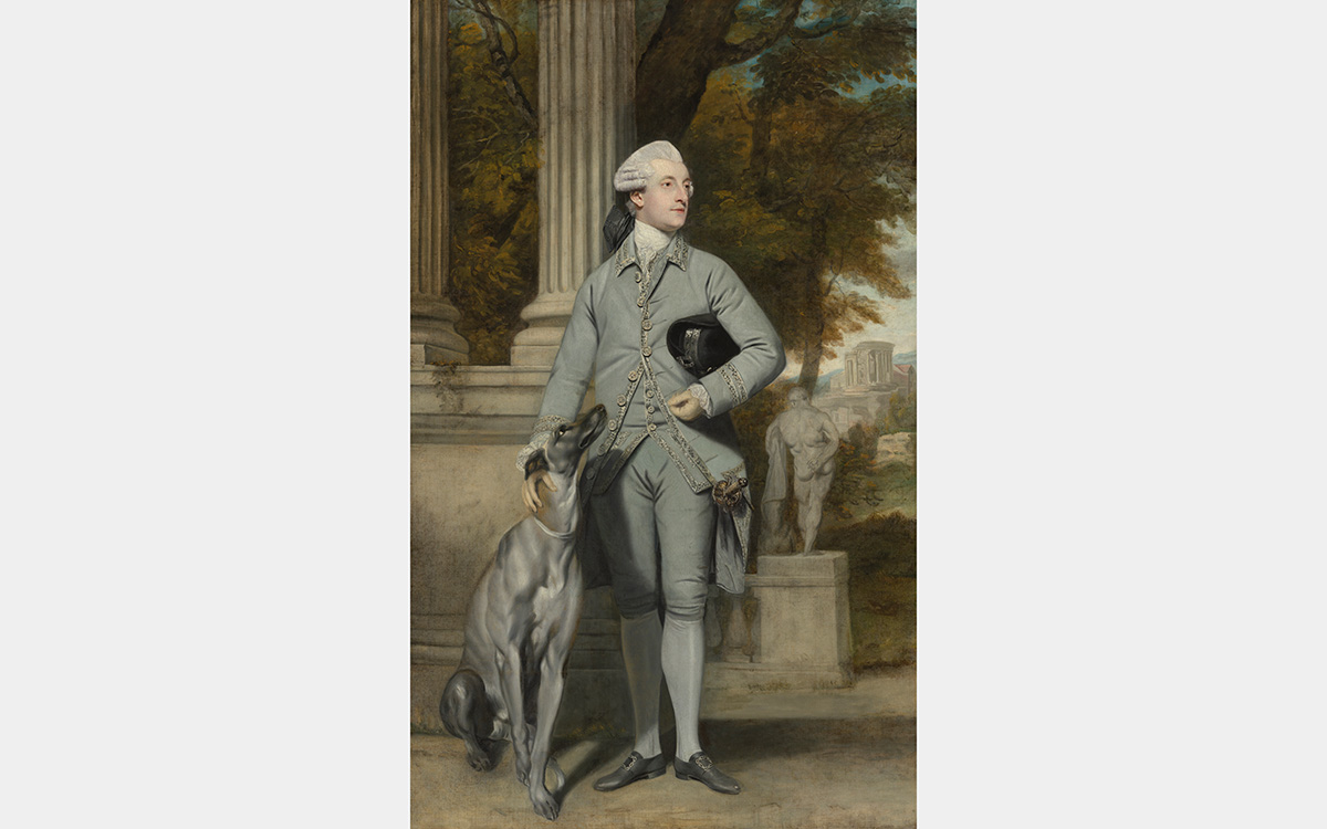 Full-length portrait of a man wearing a white wig with his dog against a landscape scene in the background with classical columns, Hercules statue, and a ruined temple on a hill.