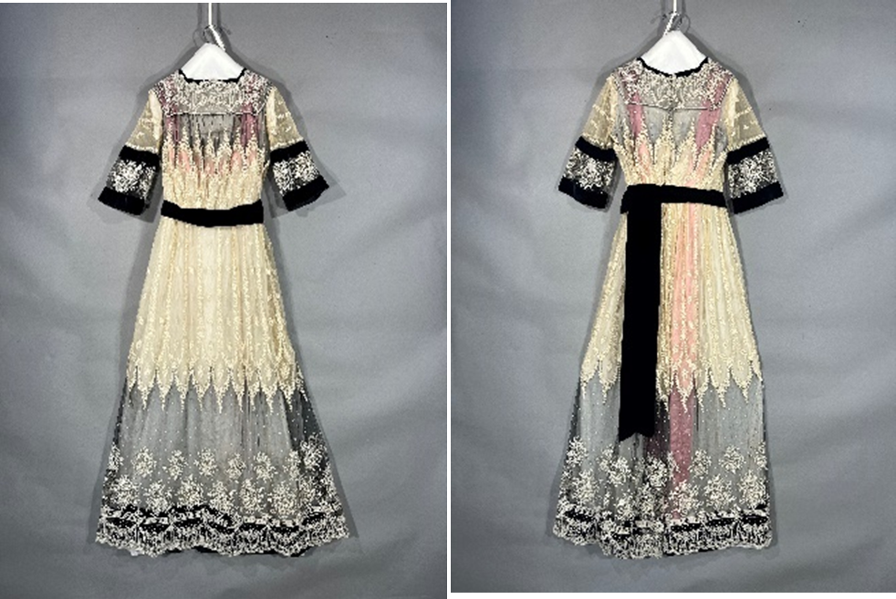 Long dress made of netting with black sash
